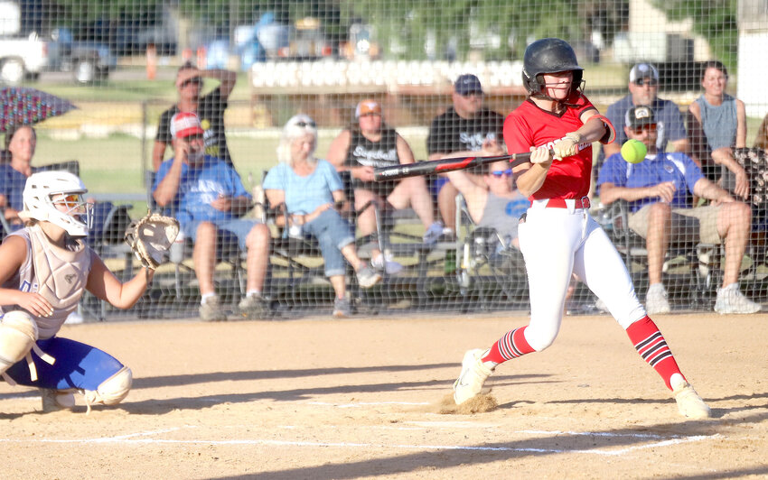 Bloodhound senior Lauryn Helmick takes a cut at a rise ball in the first inning of Wednesday's 13-1 Fort Madison win over Danville in Fort Madison.  The Hounds have now won four in a row.