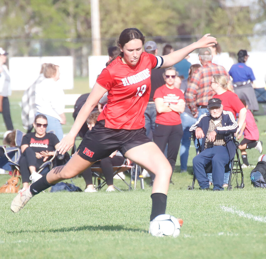 Fort Madison senior Halle Menke fires a free kick at the goal in the 1st half Tuesday night at Baxter Sports Complex. The Hounds downed Mediapolis 4-1 and remain undefeated on the season. Fort Madison did surrender their first goal of the season to the Bulldogs.