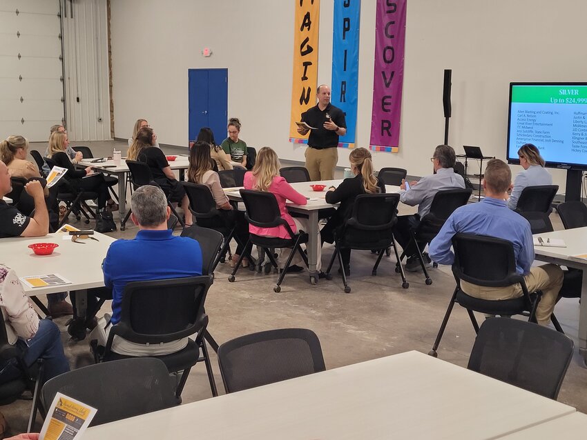 Central Lee Superintendent Dr. Andy Crozier gives a district update to a group of stakeholders at a Lee County Economic Development Group meeting Thursday evening.