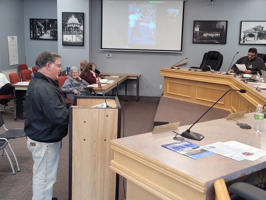 Fort Madison Parks Board member Paul Wilkerson speaks with the Fort Madison City Council Tuesday night about a statue his family is donating to Old Settlers Park in the name of his mother Rosie Wilkerson.