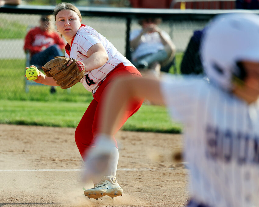 Fort Madison High School's Taylor Huffman (4) eyes first base during the first game of their double header against Burlington High School, Monday, June 9, 2025 at  Burlington's Wagner Field.