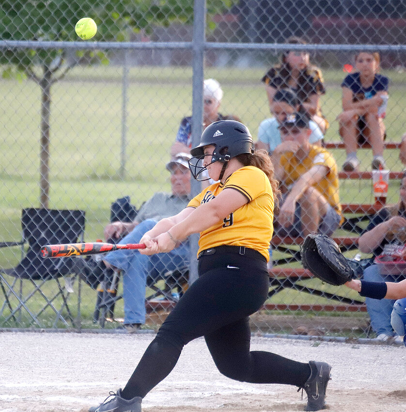 Central Lee's Jalyn Hawk pops up a pitch in the early going of the Hawks' 4-2 win over Holy Trinity Catholic Wednesday night in West Point.
