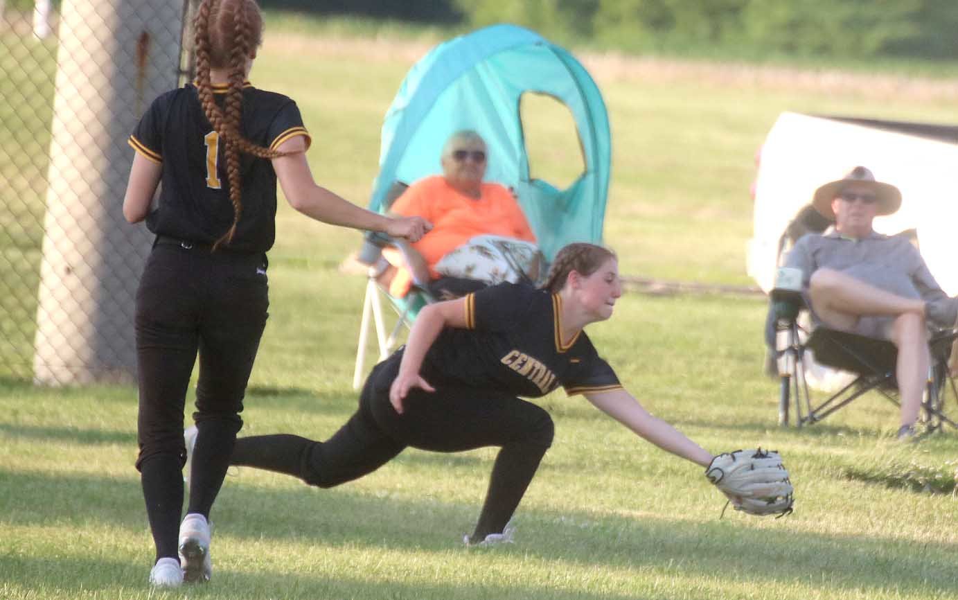 Central Lee sophomore Abby Simmons makes a sliding catch in right field in the second inning of Wednesday's 4-3 win over Winfield Mt. Union. Photo by Chuck Vandenberg/PCC