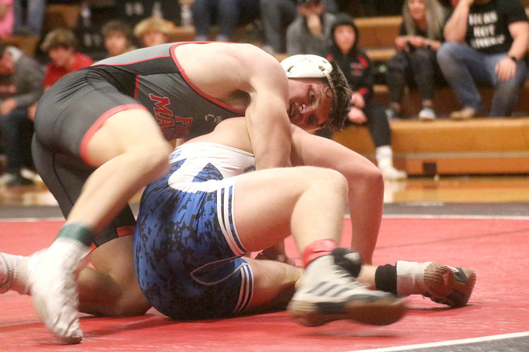 Fort Madison senior Jakob McGowan works Quincy's Bryor Newbold Thursday. McGowan took 4th at this weekend's Cliff Keen Independence Invitational at 185 lbs.