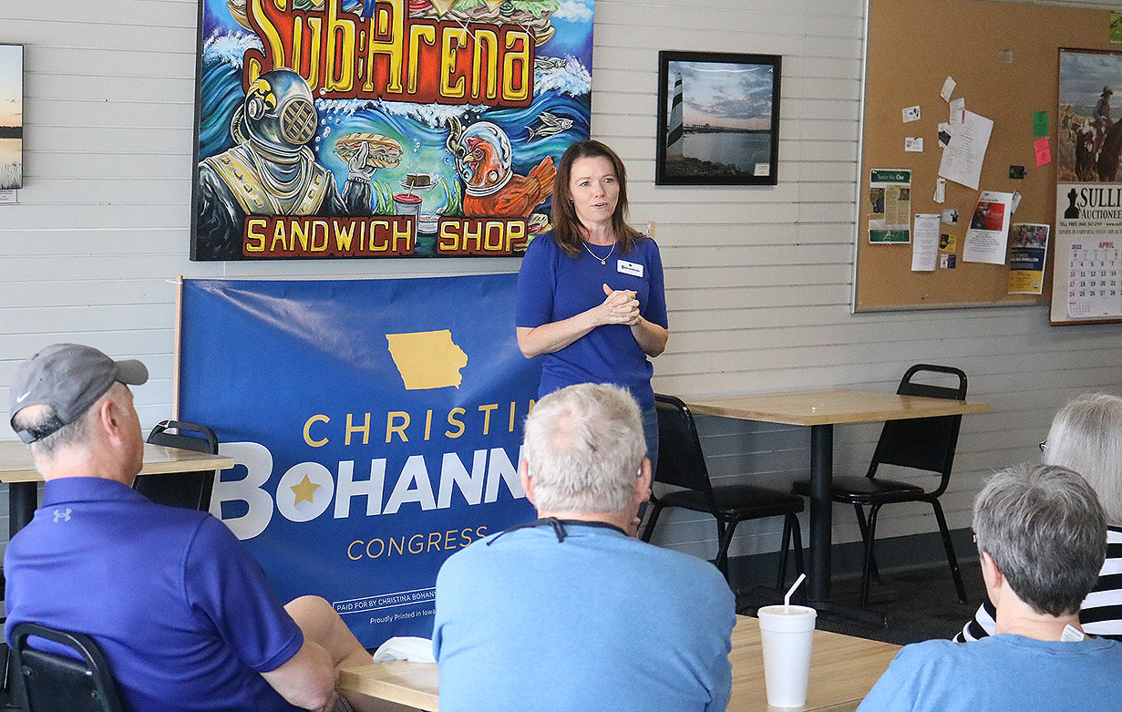 Iowa 1st Congressional District candidate Christina Bohannan talks with guests at SubArena Saturday morning on a campaign swing through Lee County. Photo by Chuck Vandenberg/PCC