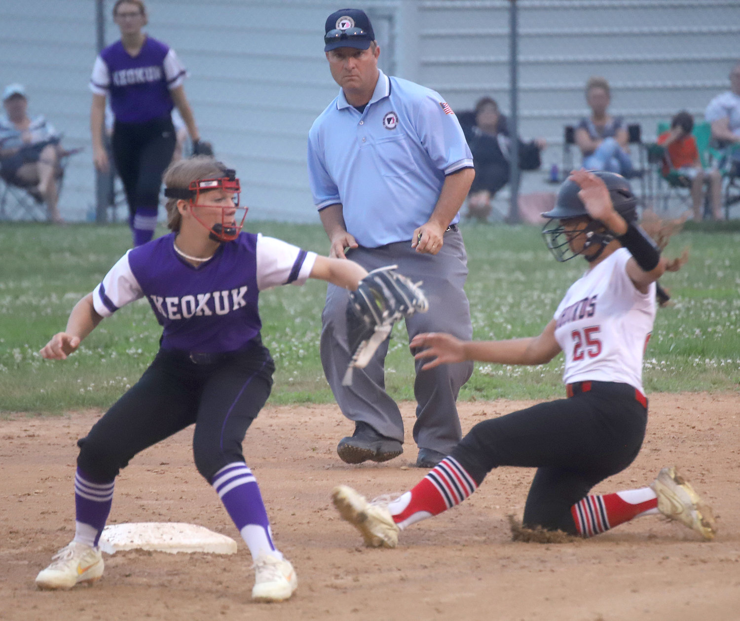 The Bloodhounds Olivia Buckner slides into second ahead of a throw in Friday's 5-0 win over Keokuk.