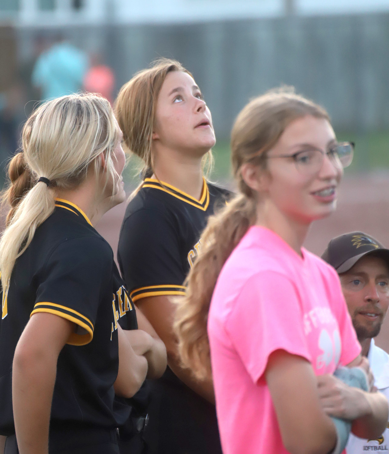 Senior Bella Steffensmeier looks to the sky to keep from tearing up as she talks to the Lady Hawks after their 4-3 season-ending loss to WB/ND Saturday.