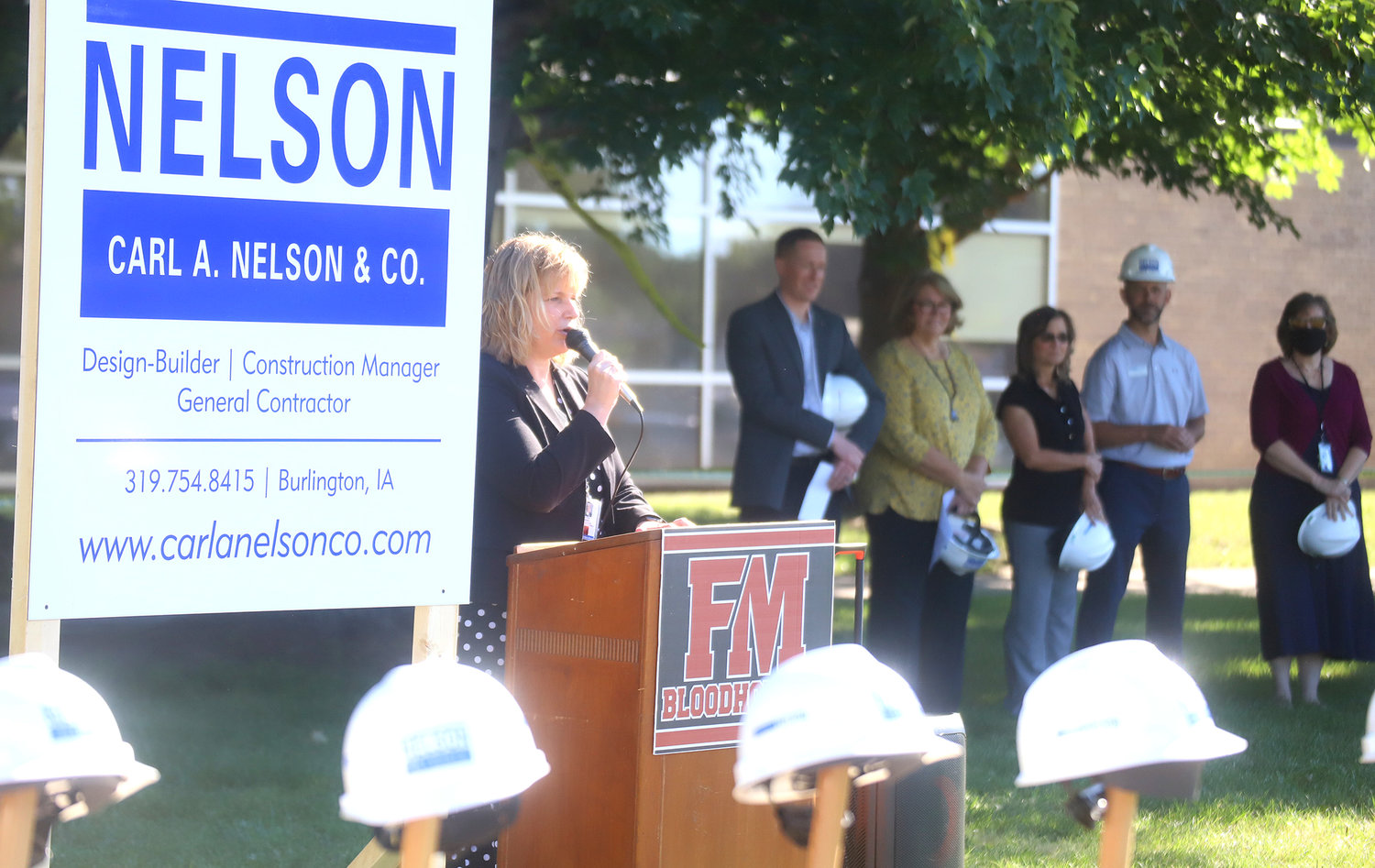 FMCSD Superintendent Dr. Erin Slater gives remarks to guests at Tuesday's groundbreaking ceremony at Fort Madison High School.