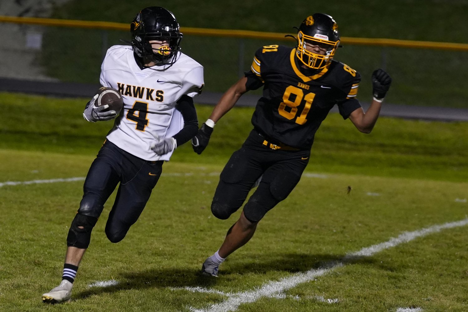 Central Lee High School's Grant Myhre (4) returns the kick during their game against Mid-Prairie High School, Friday, September 23, 2022 at Mid-Prairie.