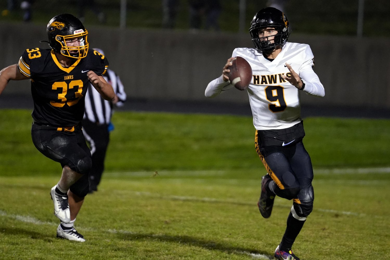 Central Lee High School quarterback Cory Jones (9) looks to pass the ball during their game against Mid-Prairie High School, Friday, September 23, 2022 at Mid-Prairie.
