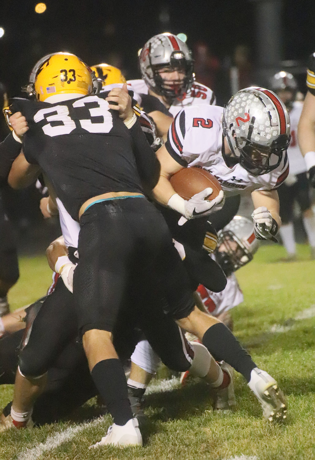 Teague Smith gets a couple of his hard-earned 51 yards in the second quarter of Friday's 49-7 loss to Waverly-Shell Rock.