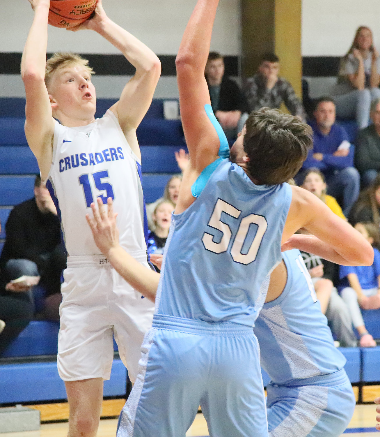Holy Trinity's Nick Fullenkamp pulls up for a jumper in the Crusaders 66-52 loss to WACO Monday night.