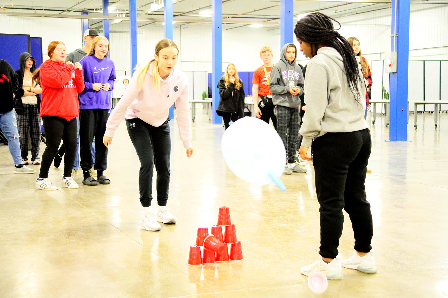 Students compete in a balloon relay as part of SCC's program at the Lee County Career Advantage Center Tuesday afternoon.