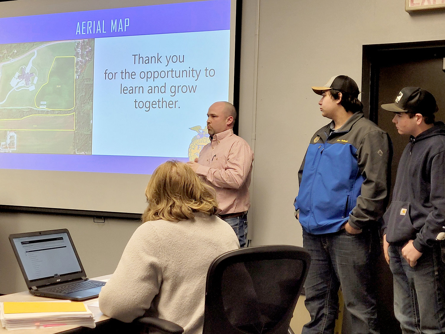 Jay Lampe, Vice President of the Fort Madison FFA Foundation, talks to the Fort Madison school board Monday night about a farming project the group wants to take on.