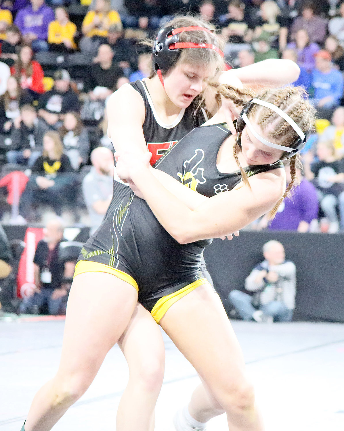 Smith works from the standing position in her first round match against Chloe Sanders of Vinton-Shellsburg. Smith went 1-2 in the 130 lb. division and was eliminated from Friday action.