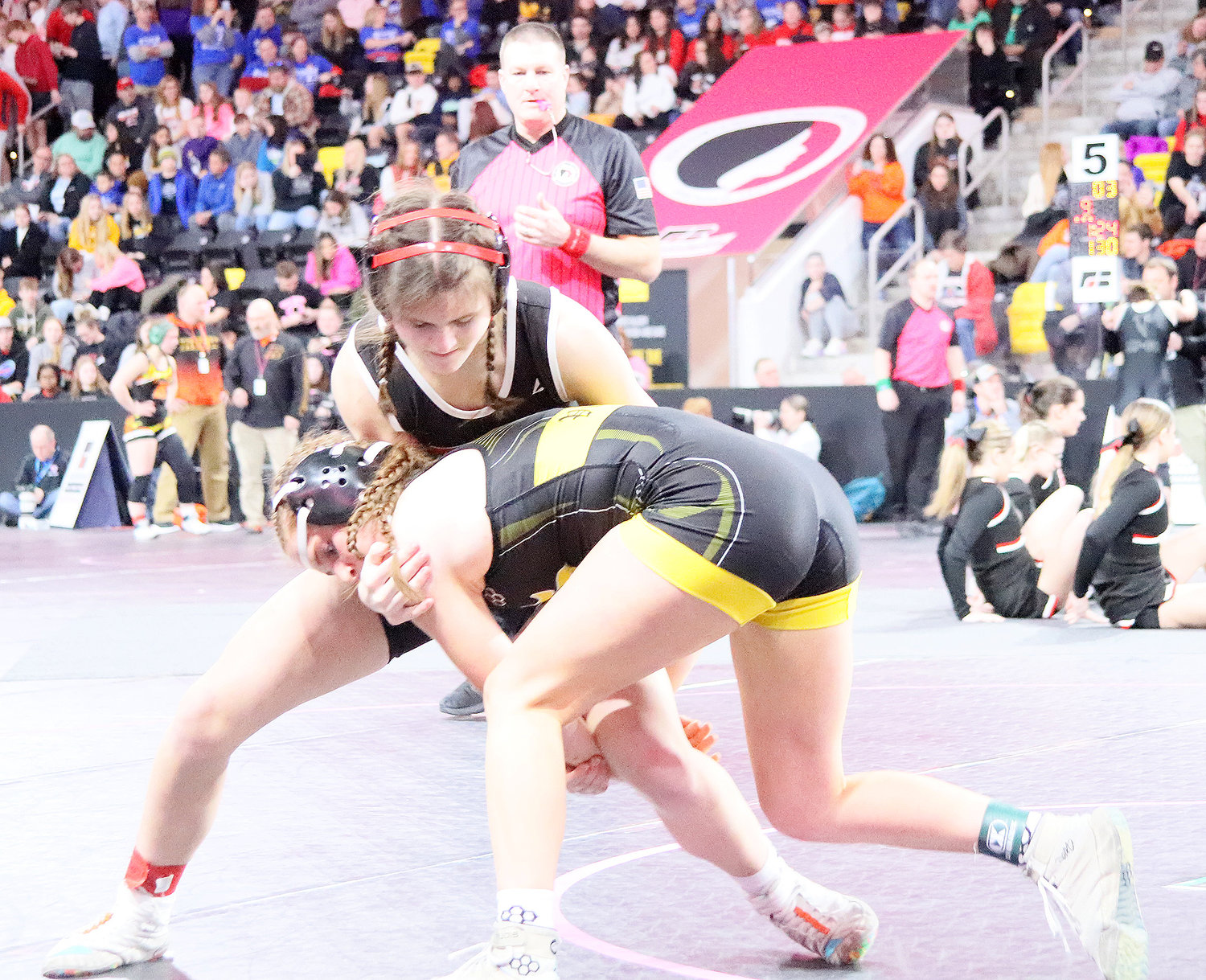 Freshman Mara Smith gets a brief advantage over No. 2 seed Chloe Sanders of Vinton-Shellsburg. Sanders would score a pinfall over Smith. Smith would go 1-2 in the IGHSAU's first-ever state wrestling tournament.