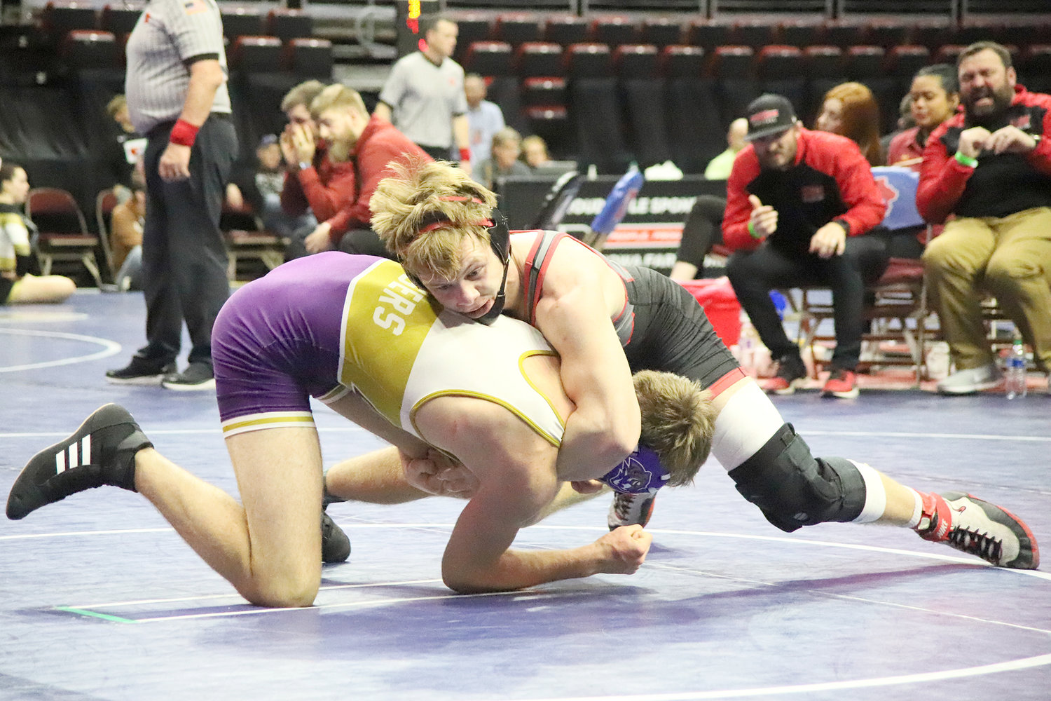 Junior Teague Smith tries to find some momentum in his match with Spencer's Jace Fullhart. Smith would lose his second 2-1 decision in as many days ending his first-ever tournament run.