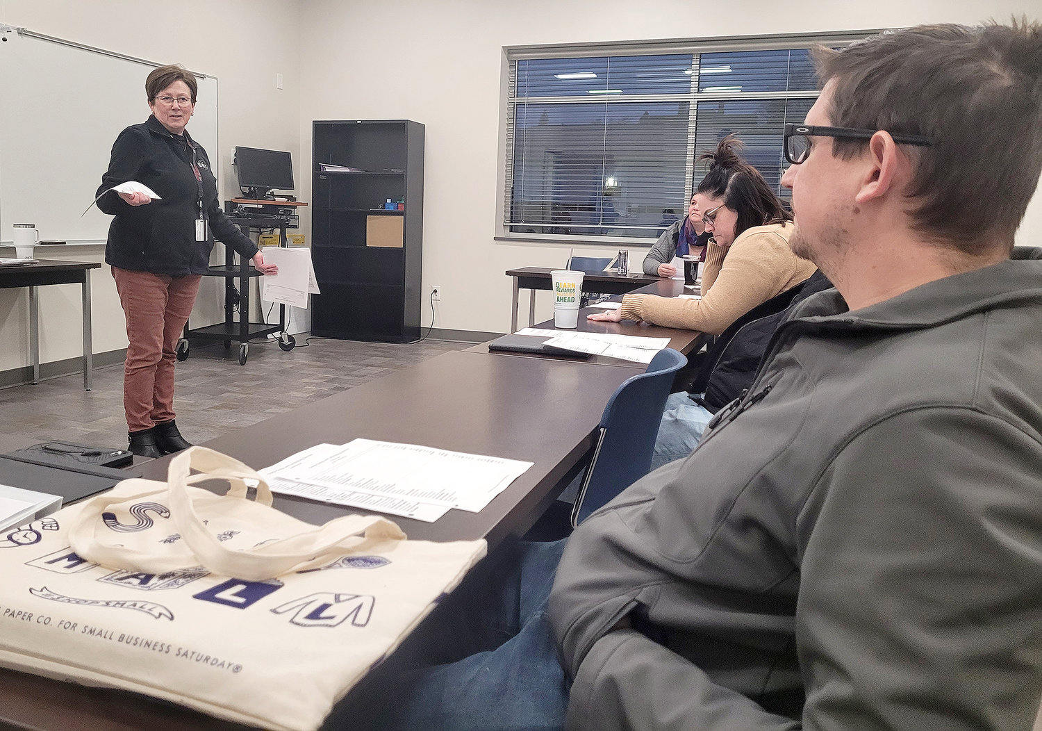 SCC Small Business Development Center Director Janine Clover talks with students Wednesday nighty during the DreamBuilder program in Fort Madison.