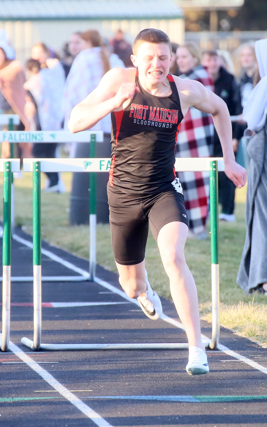 Fort Madison's Henry Wiseman clears that last hurdle in the 110 high hurdles Monday in West Burlington.