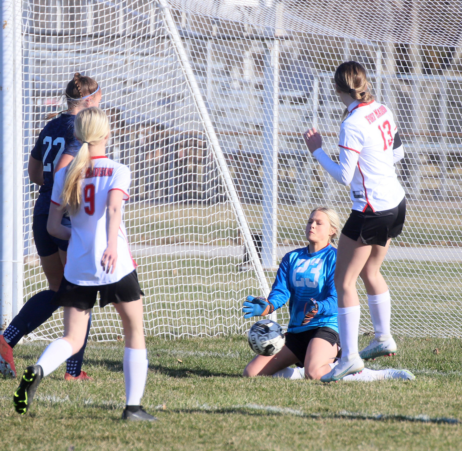 Bloodhound goalie Taylor Johnson blocks a shot on goal in Tuesday night in the Hounds' loss to the Nikes in Burlington.