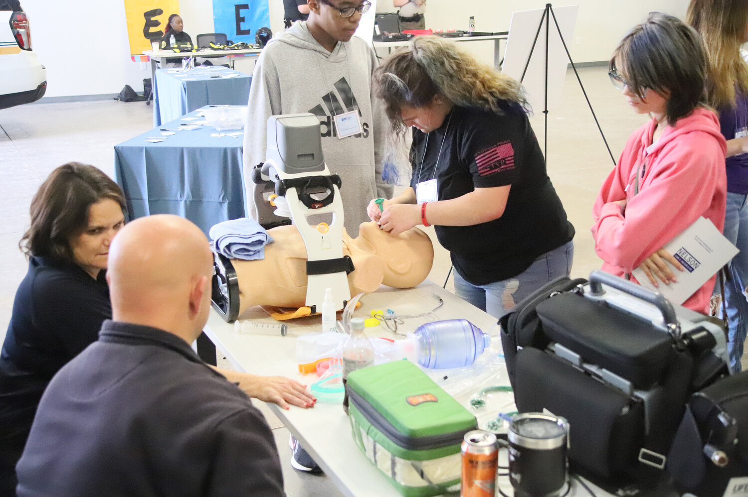 Students from Keokuk High School work on saving the life of a dummy in a simluation put on by Lee County EMS staffers Tuesday at the Career Advantage Center in Montrose.