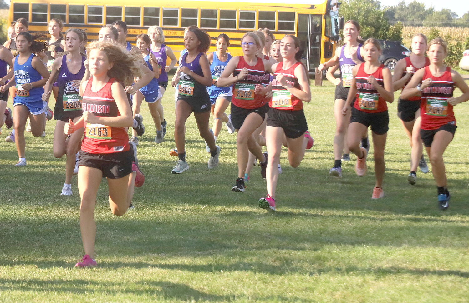 Fort Madison sophomore Avery Rump works to the front of the pack before the chute at Rodeo Park Thursday during the varsity girls' cross country run at the Timm Lamb Invitational. Rump would win the event with a 19:48.3. The Lady Hounds finished 2nd behind Washington.