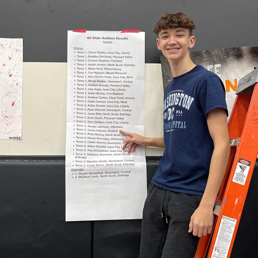 Keokuk's Carter Killoren points to his name on the list of All-State Chorus selections at Keokuk High School this week. Killoren joins Fort Madison's Aiden Benda as locals making the choir.