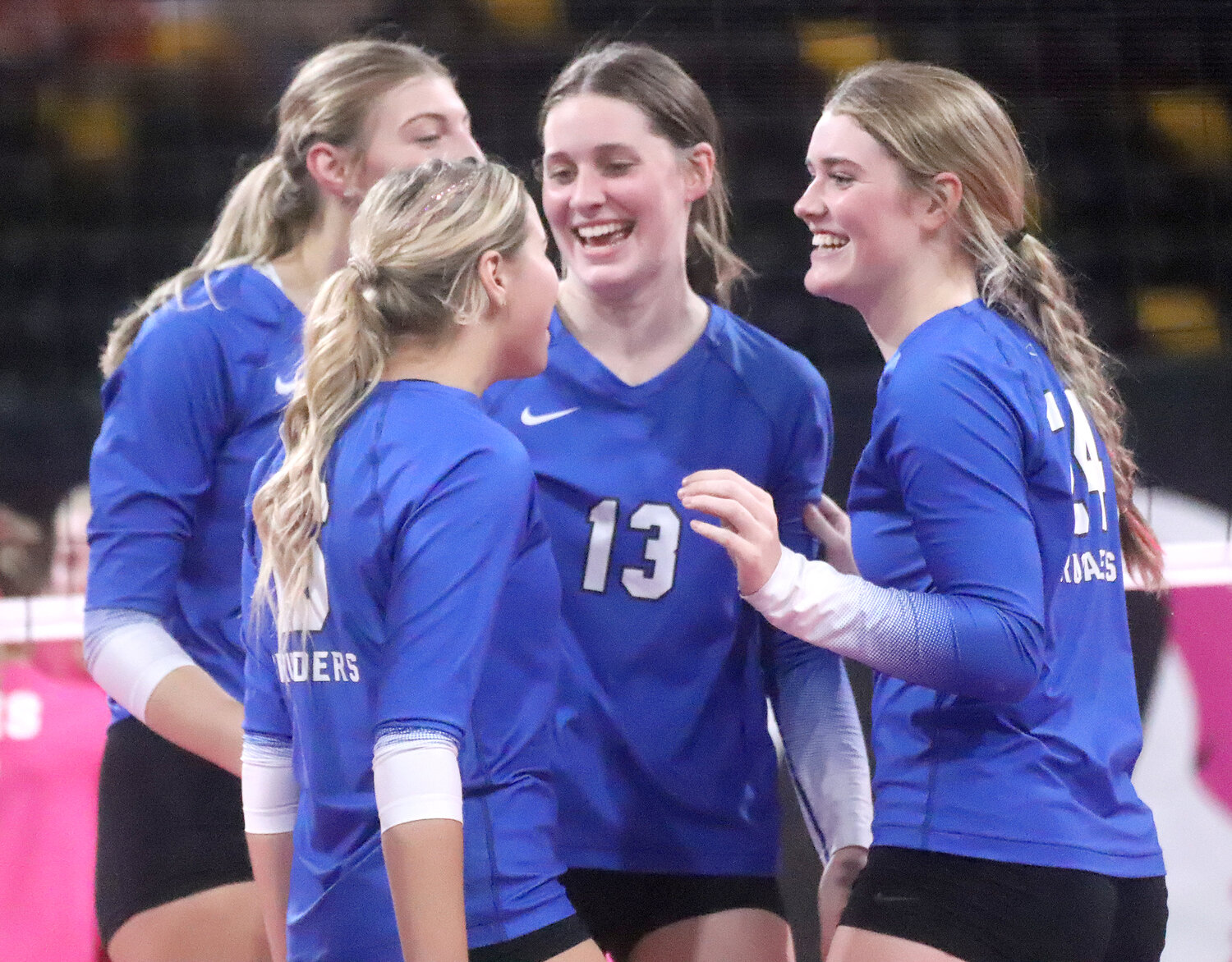 The Holy Trinity Catholic Crusaders celebrate after a point in the third set. HTC downed No. 6 Don Bosco 25-21, 25-17, 25-21 to advance to the Class 1A semifinals Wednesday night.