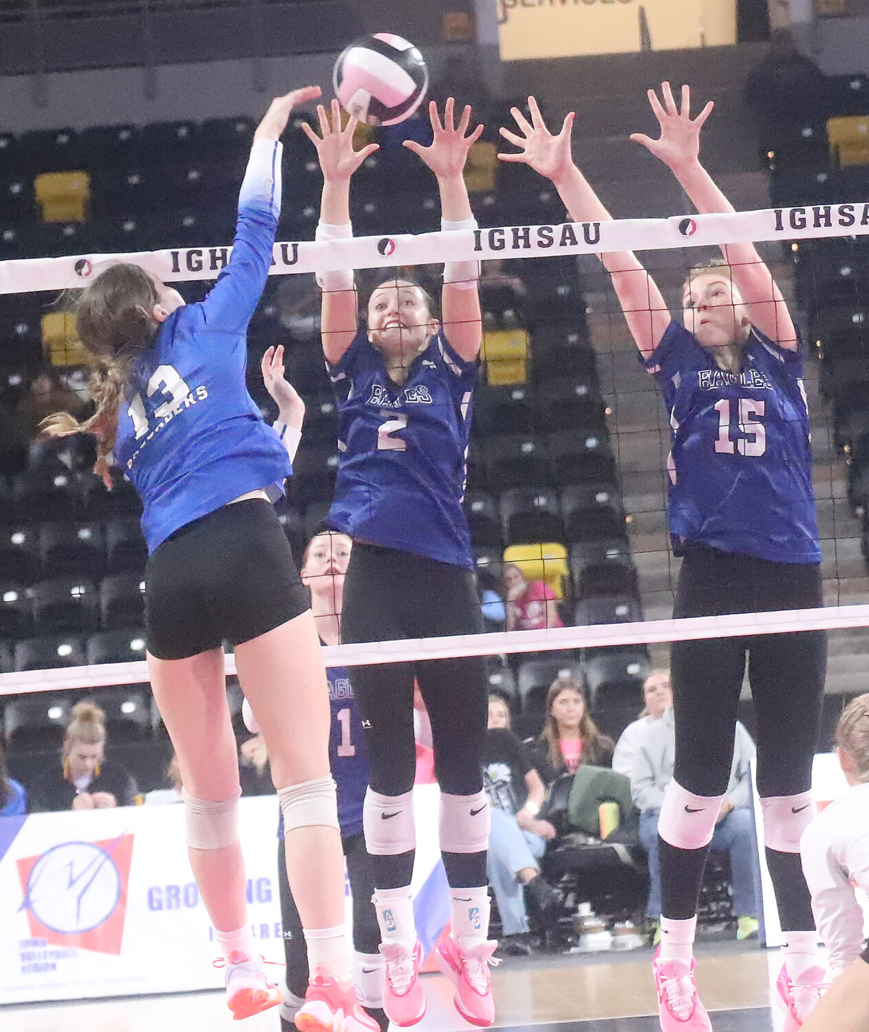 Mary Kate Bendlage goes for a kill against the Eagles front line defense in the third set Thursday night at Xtream Arena in Coralville