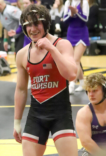 Senior Joe Hartman smiles after getting a 3rd place finish in Bettendorf Saturday. Hartman's win gave him a wrestleback for a true second-place finish, but he came up short. His third place finish gives him an entry into the IHSAA boys state tournament beginning Wednesday in Des Moines.