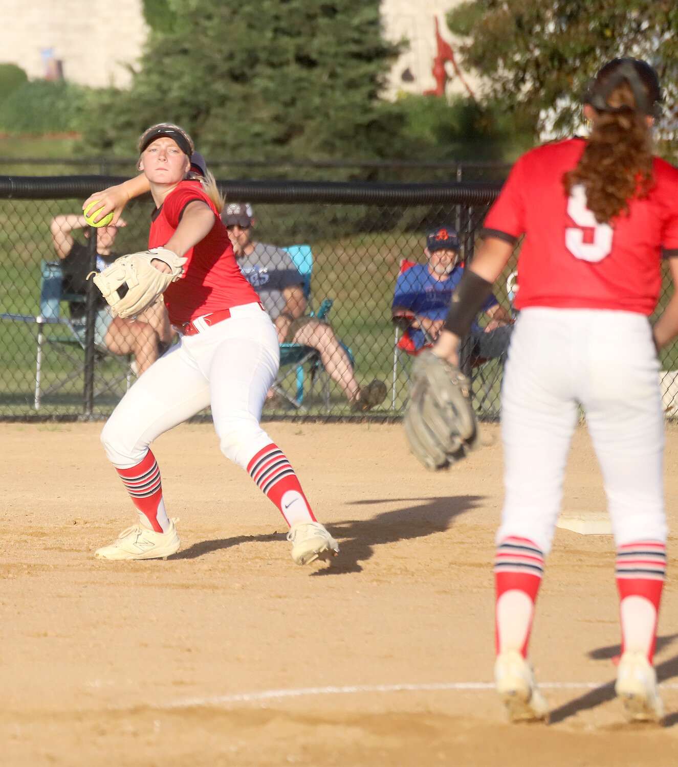 Fort Madison's Elle Ruble comes up throwing on a ground ball to third base in the second inning of Wednesday's 13-1 win over Danville at Baxter Sports Complex in Fort Madison.