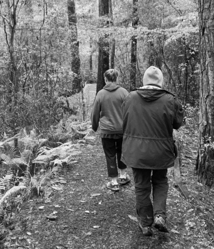 Two hikers enjoy walking on one of the trails in the Big Thicket National Preserve. COURTESY PHOTO | SILSBEE BEE