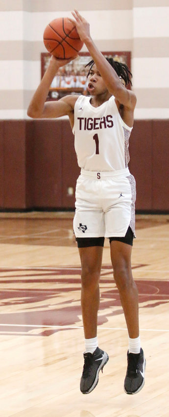 Jared Harris (1) goes up for a shot during first-half action of Silsbee&rsquo;s win at home over Memorial. Harris pumped in 26 points in the win on Nov. 20 at home.