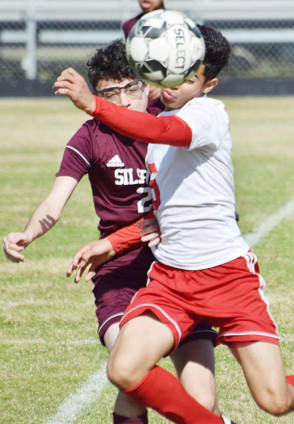 Silsbee&rsquo;s Cody Rodriguez (2) battles a Furr player for the ball during the second day of the Hargrave Falcon Region 3 Showcase in Huffman. The Tigers lost to Furr, 2-0, on Jan. 14.