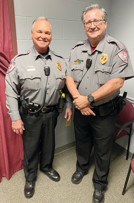 Retired Police Chief Kenny Davenport (left) is pictured with new chief, Ronald Smith.