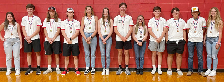 Members of the KHS tennis team who won medals the District 22-3A tournament were (left to right) Brooklyn Theeck, Seth Kees, Landon Graham, Parker Martinka, Peyton McLaurin, Lalanya Havard, John Allen, Kyley Israel, Mason Dean, Zac McDonald, Ayden Welch and Reagan Carr.