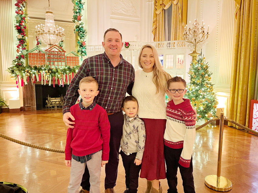 Skylar Martin, second from right, was one of hundreds of applicants chosen to decorate the White House in Washington D.C. Martin and her husband, Kyle Martin are both Pleasant Hill natives. Martin is standing with her three sons, Cohen, 5, Aiden,  7, and Liam, 9, at the Gold Star tree, which is dedicated to the families of soldiers killed in action, during an event Sunday.
