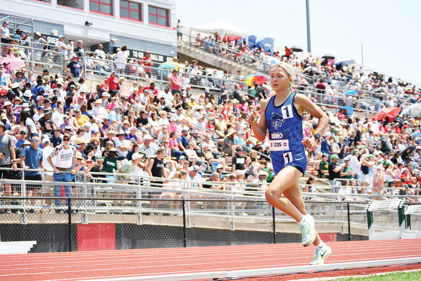 Harrisonville’s Kayleigh Norris runs down the home stretch with a big lead during the 1,600-meter run at the 2023 state track and field meet. Norris won the race, earning her first state title. She also placed second in the 800- and 3,200-meter runs at state. She’s back for her junior season, fresh off a state championship in cross country last fall.