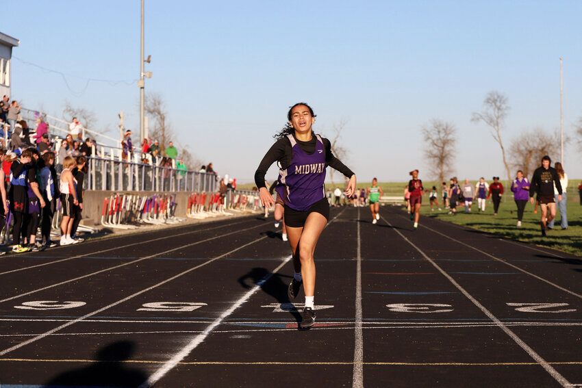 Midway freshman Moriah Perrenoud-Moore wins the 400-meter dash in a time of 1 minute and 2.84 seconds. Perrenoud-Moore has a been a dominant force in the 400 dash during the first month of the season.