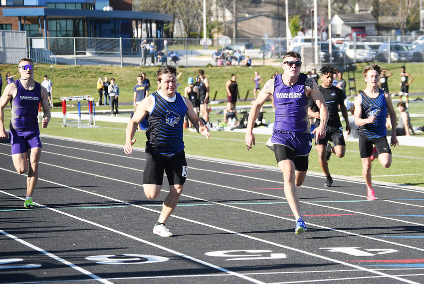 Harrisonville junior Nate Reynolds and Pleasant Hill senior Tyler Wis race to the finish line in the 100-meter dash at the Brutus Hamilton Invitational.