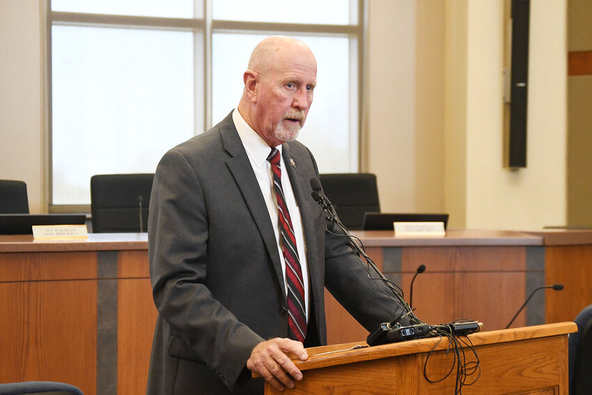 Raymore Mayor Kris Turnbow delivers a speech at his press conference, stating the city council would be voting on an ordinance to agree to a settlement with developers to end the threat of a landfill in Jackson County, just north of the city’s border. The city council approved the ordinance at its special meeting. The ordinance passed unanimously.