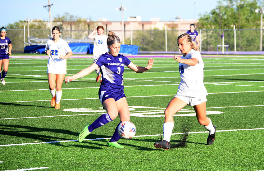 Pleasant Hill sophomore Haley DiMarco (3) and Harrisonville freshman Brylee Jackson (10) compete for possession of the ball during last week's match. DiMarco scored two goals in the Chicks' 6-1 victory.