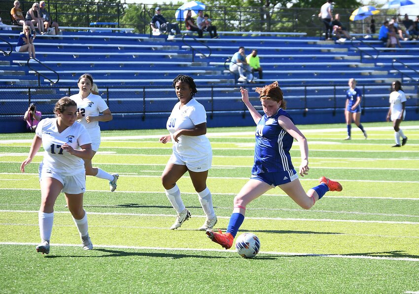 Harrisonville freshman Rylie Ingrassia takes a shot on goal during Saturday’s Class 2 District 7 quarterfinal against Center. Ingrassia scored three goals in the Lady Wildcats’ 8-0 mercy-rule win.