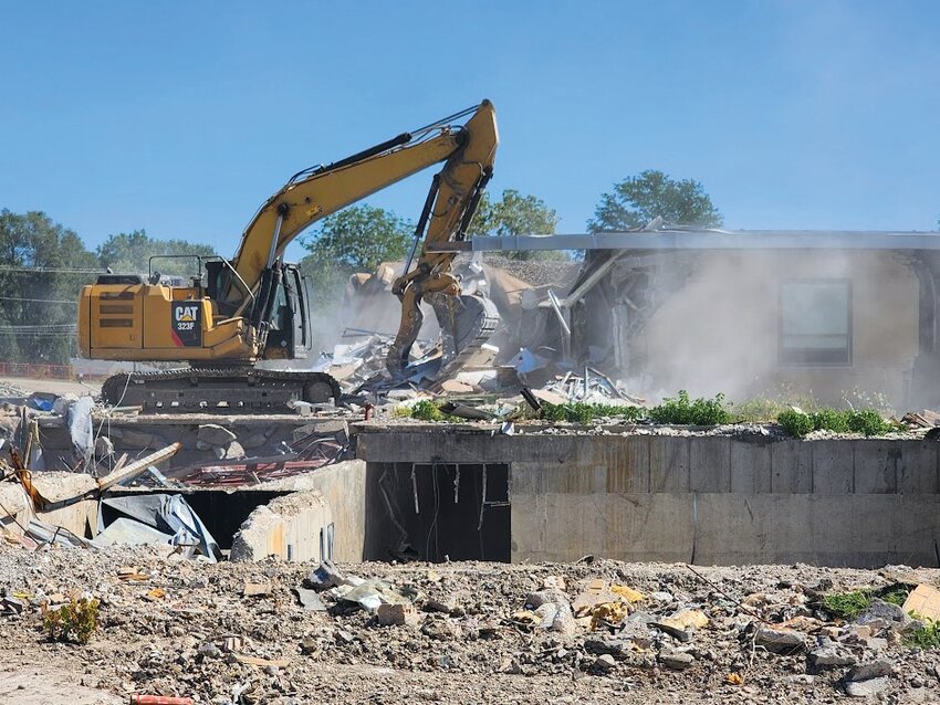 Crews working for 27 Management, LLC, tore down the remaining walls of the old Cass Medical Center on East Mechanic Street last week. The work had been on hold because of an asbestos issue, but the work began last Wednesday when the developers received the OK from the Missouri Department of Natural Resources.