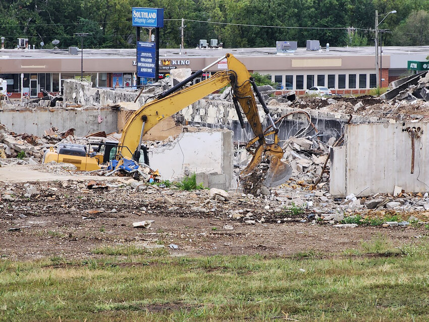 Workers were on site Tuesday afternoon digging out the basement area of the old Cass Medical Center on East Mechanic Street. Developers have planned to build an apartment complex on the site, but tensions are high between them and the city about how the project is progressing.