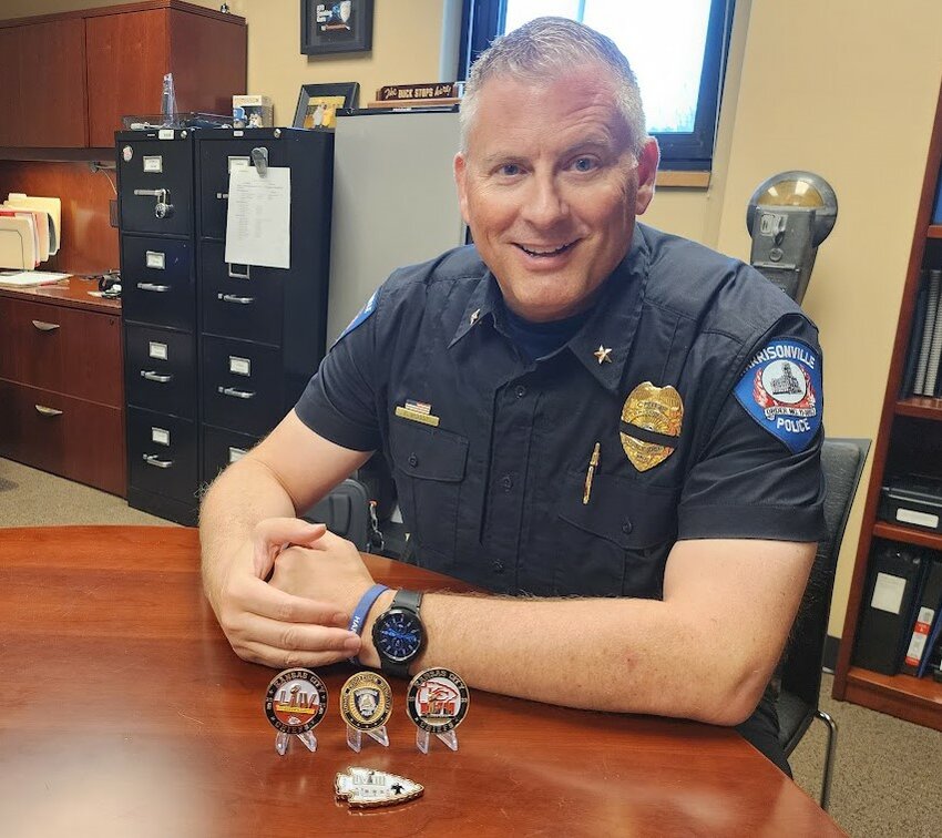 Randy Moody officially took over as the new chief of police in Harrisonville last week. The Nixa native returned to the area from Aurora, Colorado, where he served since 1996. Moody showed some of the challenge coins he has collected through the years, including recent ones celebrating Kansas City Chiefs Super Bowl victories.