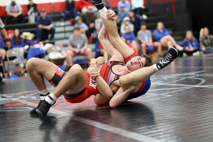 Sherwood’s Blake Eads wrestles Lexington’s Braxton Emerson at a dual last week. Eads won the match by fall. Over the weekend, Eads went 5-0 at Lone Jack, winning the 150-pound title.