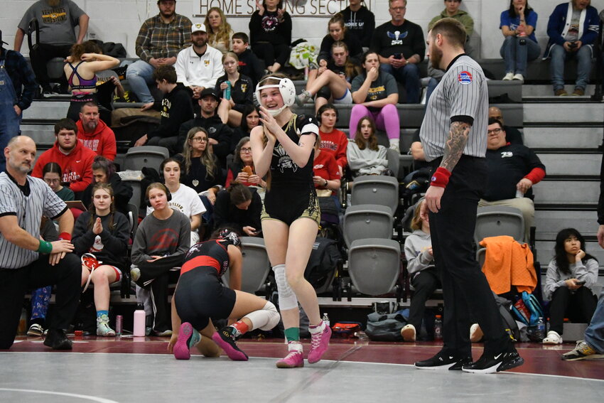 Adrian junior Dallys Shaffer cracks a big smile after winning her consolation semifinal match and qualifying for the state tournament. Shaffer finished third in the 100-pound bracket at the Class 1 District 3 Tournament on Saturday. The state tournament will begin next Wednesday in Columbia.