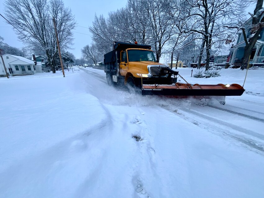 Harrisonville city crews worked to clear the streets after a snowstorm this winter. This year’s winter weather has forced schools to cancel nearly two weeks of classes. Some districts have already begun making up days because of the number of days missed in the classroom.