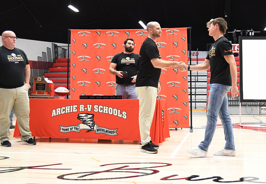 The Archie football team honored Miles Humbird's family with a memorial during Friday night’s ring ceremony. Humbird was a senior on this year’s team who was tragically killed in a car accident hours after the title game.
